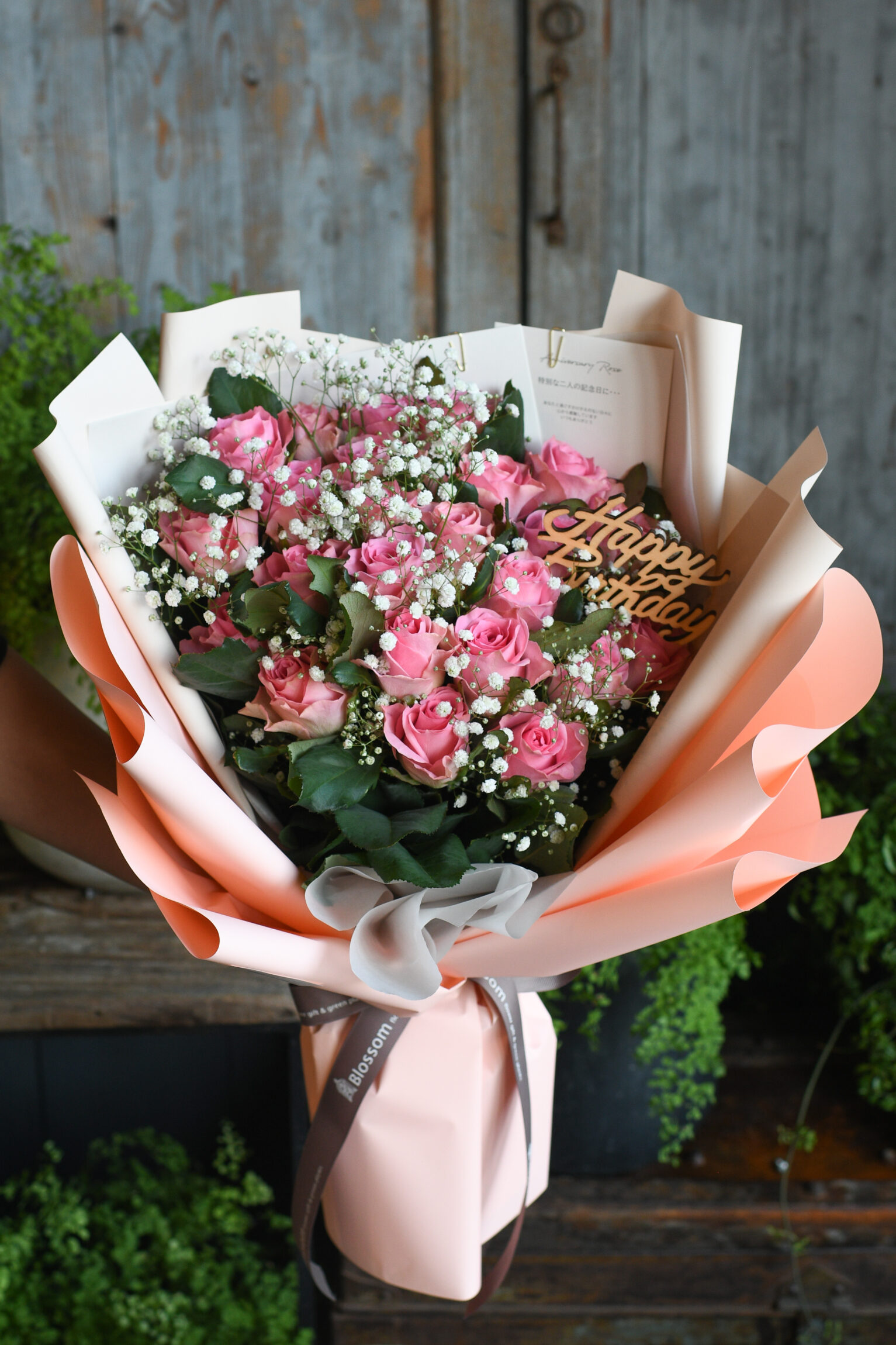 24本のピンク薔薇ドレスブーケ